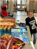 Young Girl Beside Refreshments Table