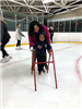 Mother Helping Her Kid Learn How to Skate