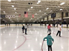 Several Attendees Skating on the Ice 2
