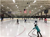 Several Attendees Skating on the Ice 3