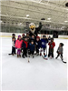 Bald Eagle Mascot with Young Skaters