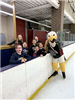 Kids and Bald Eagle Mascot Look at the Camera