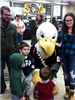 Sully the Bald Eagle Mascot at the Entrance of the Ice Rink Entertaining Kids