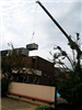 Crane Placing a Condenser on the Roof