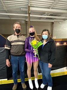 2021 Award Winner for Figure Skating, Laney Karpowicz Pictured with Roberts Family Members