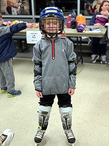 Kid Equipped with Ice Skating Gear