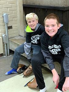 Two Boys Putting on Their Skates