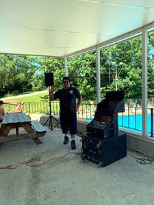 Volunteer Oversees the PA System