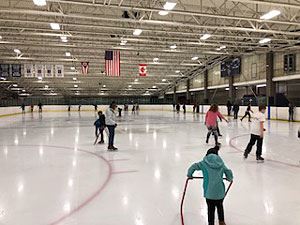 Several Attendees Skating on the Ice 2