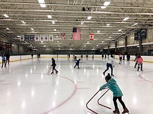 Several Attendees Skating on the Ice 3