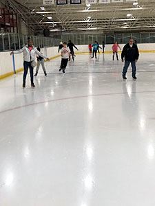 Several Attendees Skating on the Ice 6