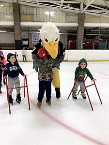 Bald Eagle Mascot Helping Kids Learn How to Skate 1