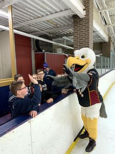 Bald Eagle Mascot Waving to Kids