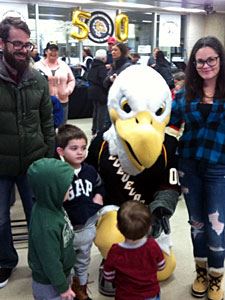 Sully the Bald Eagle Mascot at the Entrance of the Ice Rink Entertaining Kids