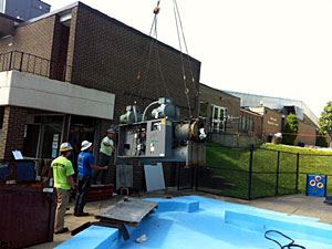 Crane Lifting the Compressor