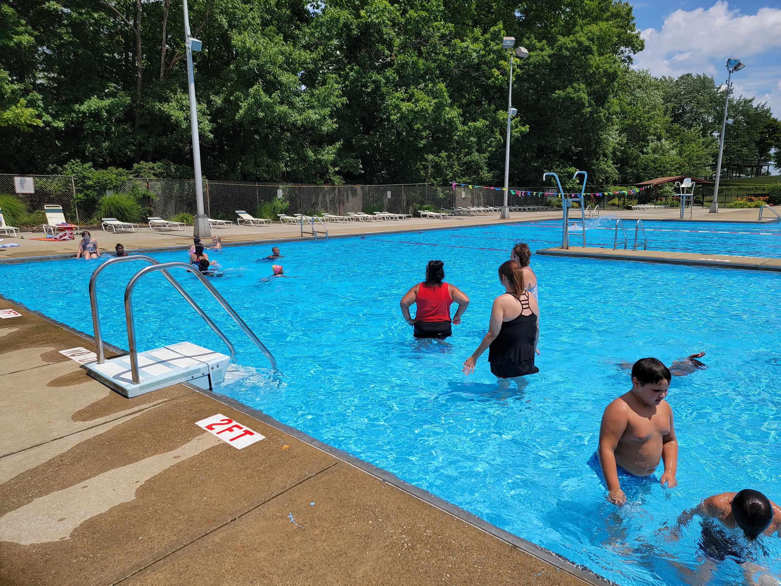 Daycare kids playing in pool